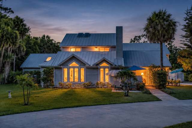 Twilight exterior of 14757 Stirrup Ln, Wellington FL